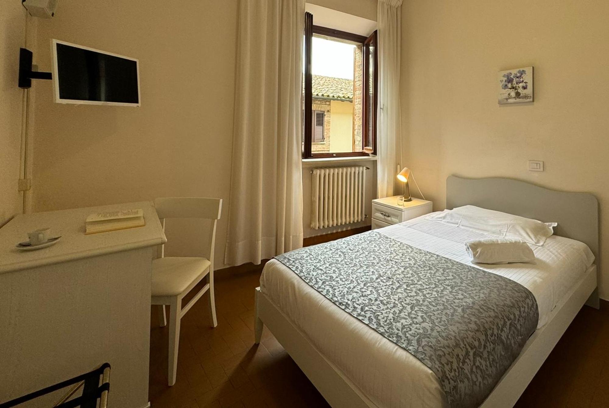 托迪 Monastero Ss. Annunziata酒店 外观 照片 A room at the hotel