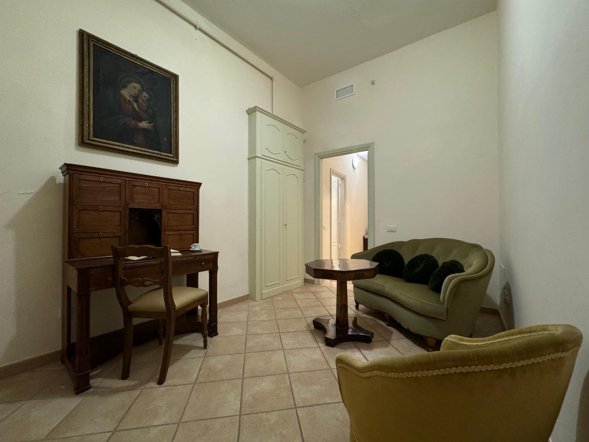 托迪 Monastero Ss. Annunziata酒店 外观 照片 The living room of the apartment