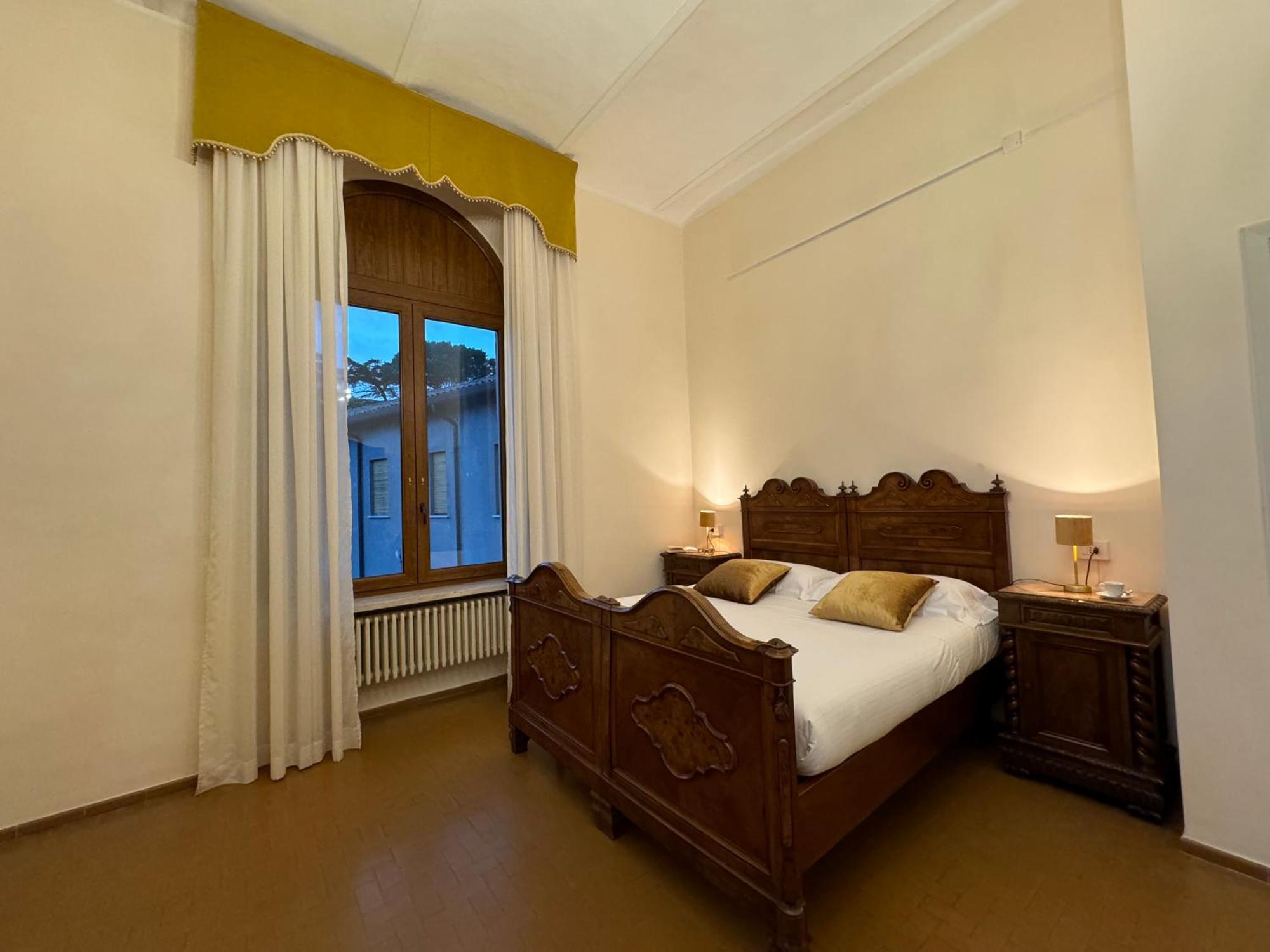 托迪 Monastero Ss. Annunziata酒店 外观 照片 A room at the hotel